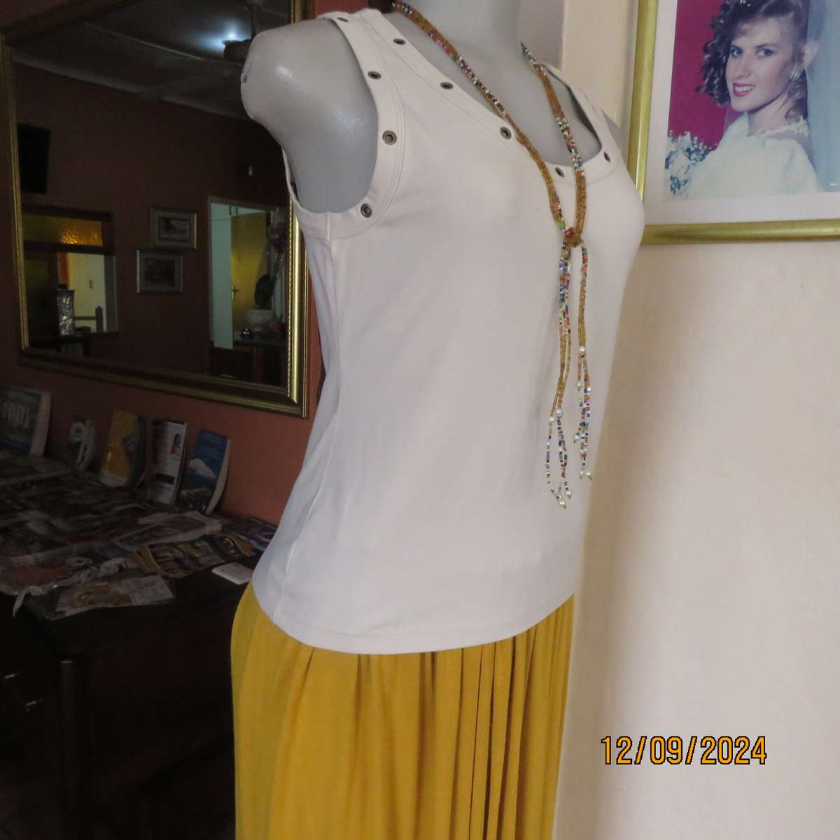 Top of the line sleeveless brass stud decorated top in light fawn. By WOOLWORTHS size 36. New cond.