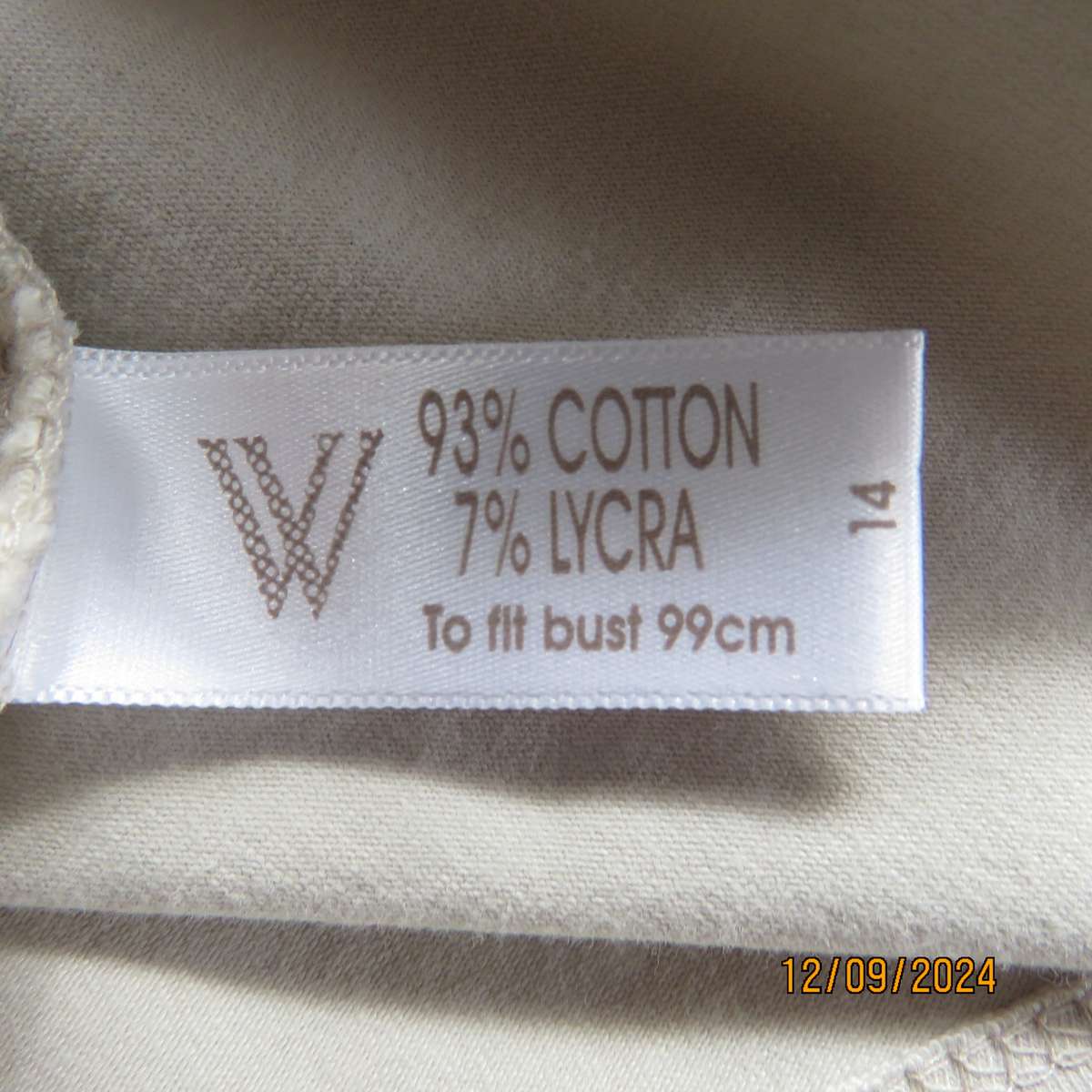 Top of the line sleeveless brass stud decorated top in light fawn. By WOOLWORTHS size 36. New cond.