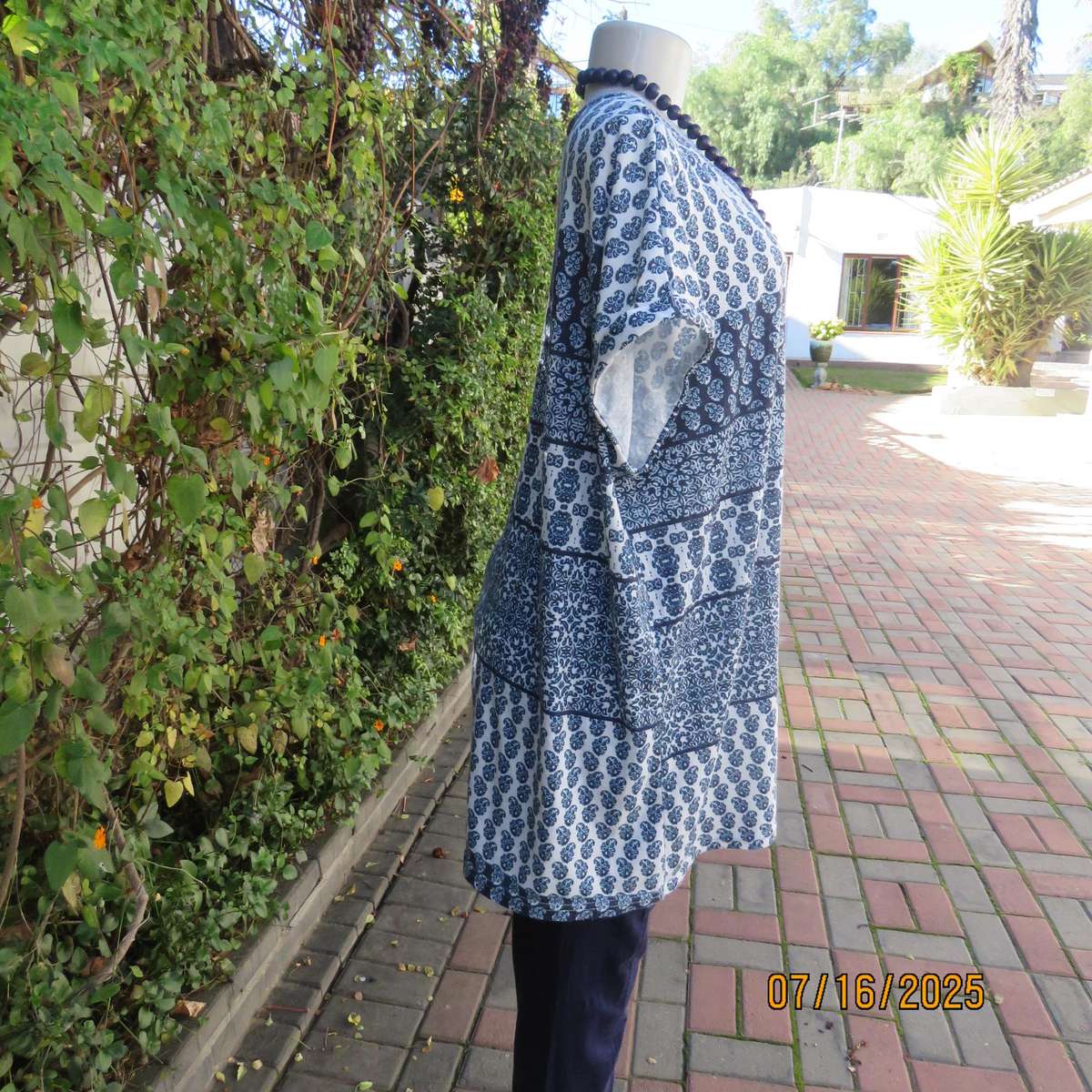 Slip over horizontal patterned polycotton stretch top size 48. Tiny cut-on sleeves