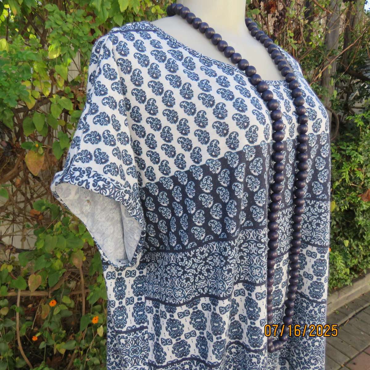 Slip over horizontal patterned polycotton stretch top size 48. Tiny cut-on sleeves