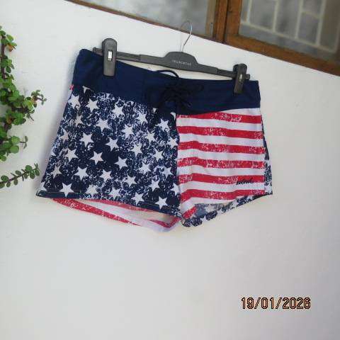 American flag print cute ladies shorts in polyester with tiestring on front. Size 38