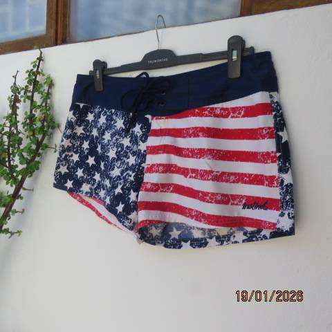 American flag print cute ladies shorts in polyester with tiestring on front. Size 38