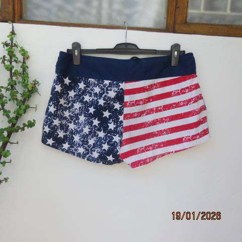 American flag print cute ladies shorts in polyester with tiestring on front. Size 38