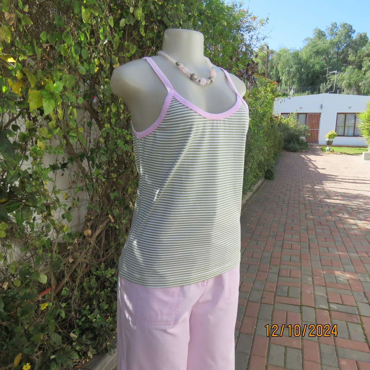 Chic olive green/white horizontal striped cotton top by INDIGO from Canada.Size 34/36. Pink edging.