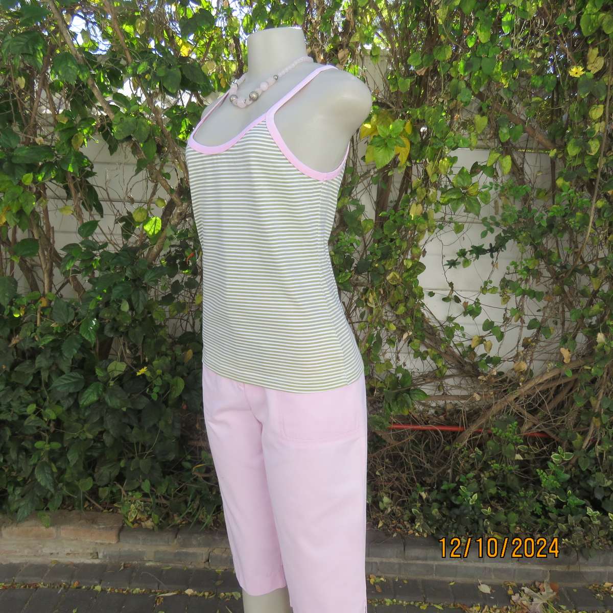 Chic olive green/white horizontal striped cotton top by INDIGO from Canada.Size 34/36. Pink edging.