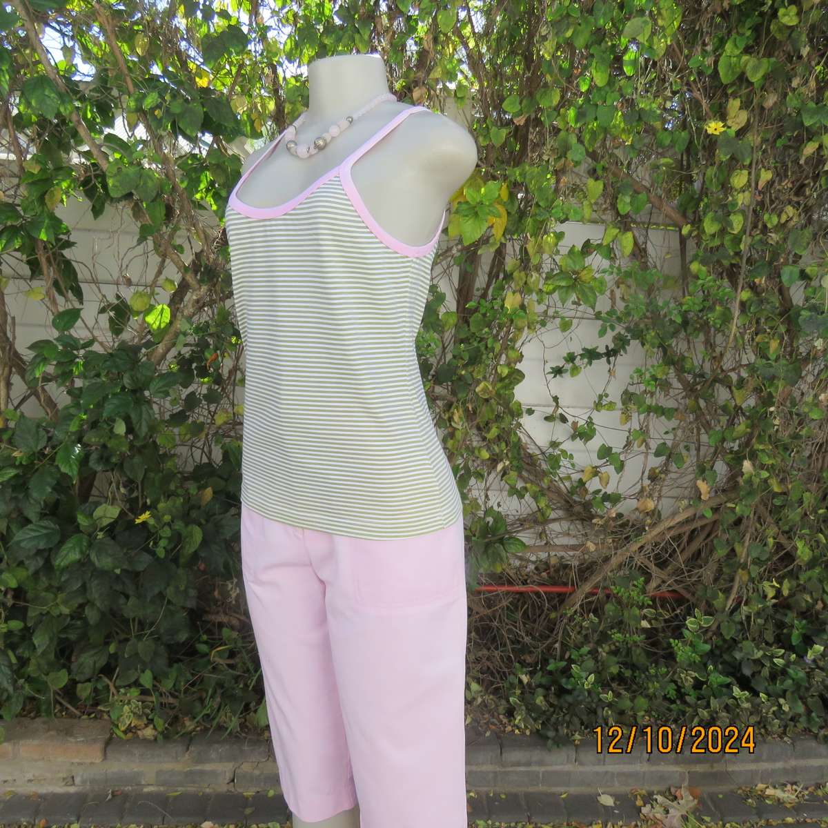 Chic olive green/white horizontal striped cotton top by INDIGO from Canada.Size 34/36. Pink edging.