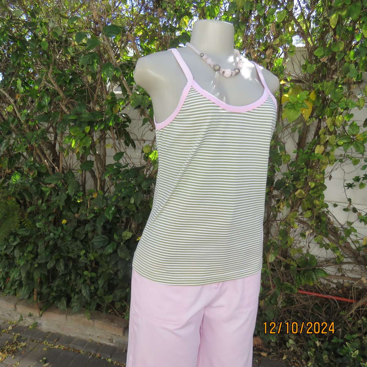 Chic olive green/white horizontal striped cotton top by INDIGO from Canada.Size 34/36. Pink edging.