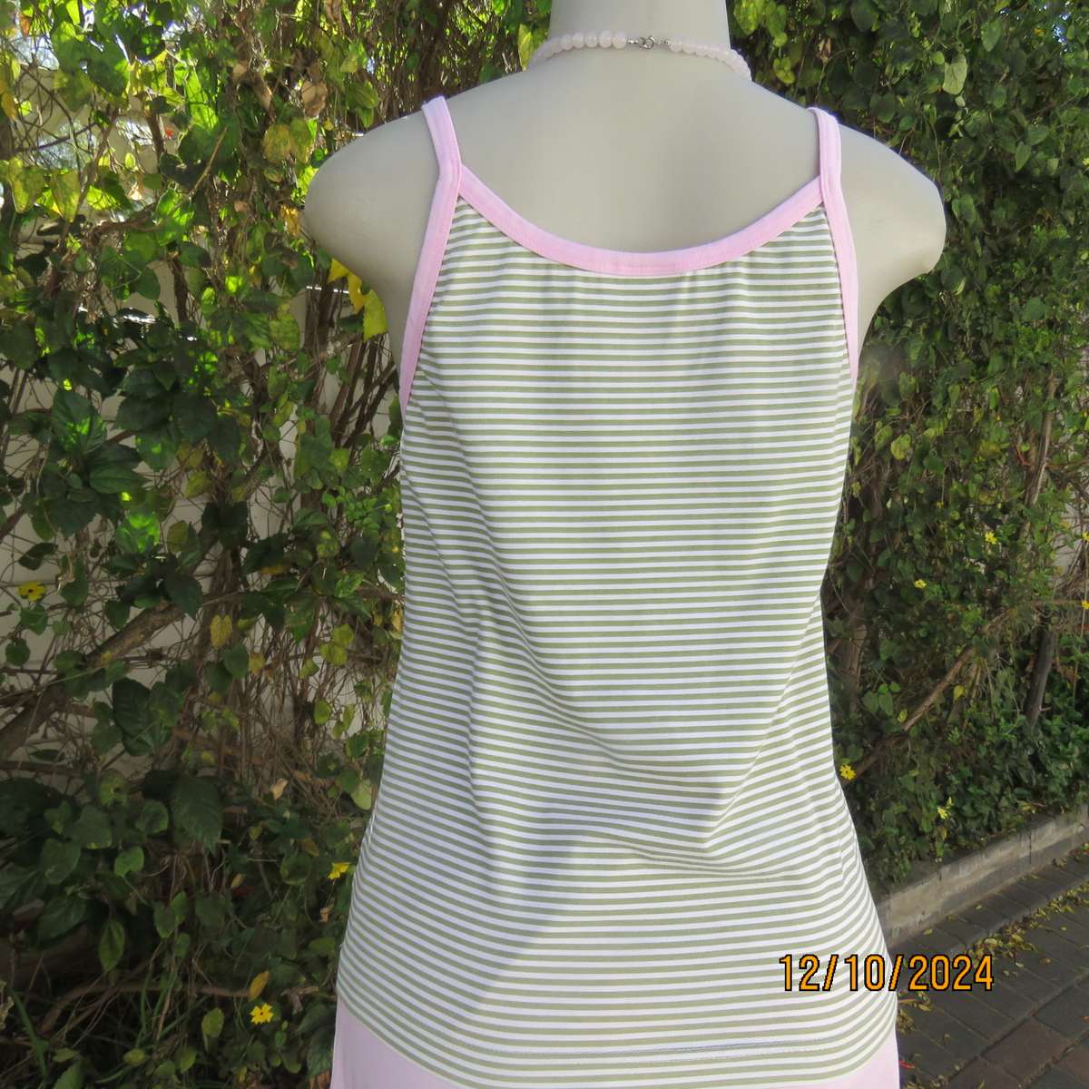 Chic olive green/white horizontal striped cotton top by INDIGO from Canada.Size 34/36. Pink edging.