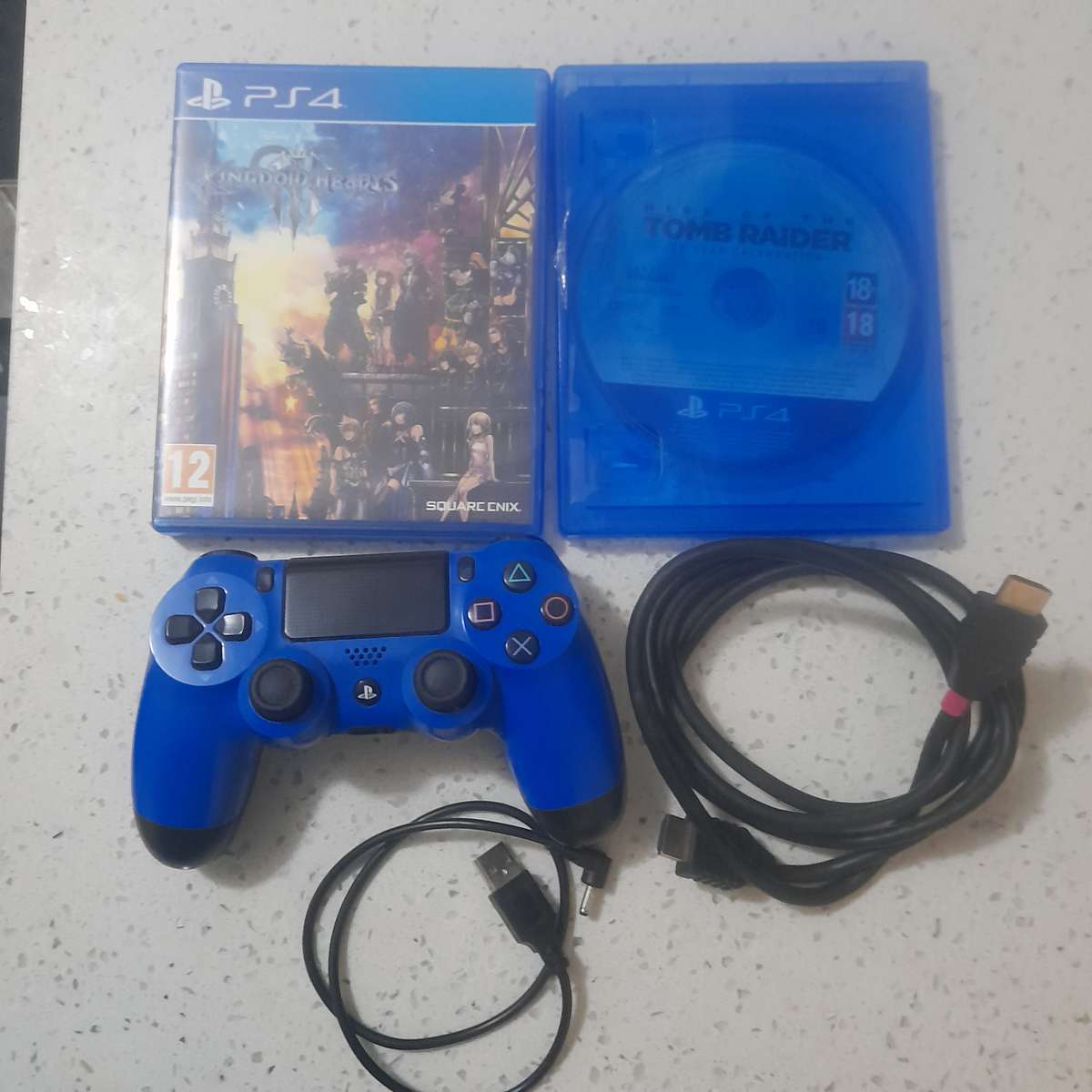 PlayStation 4 Console with 1 Controller, 2 Games, Fan, HDMI, Power Cables Bundle