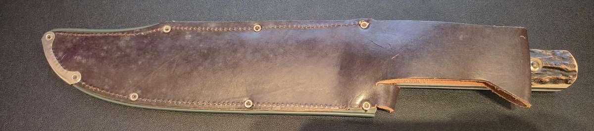 Original handmade German Solingen Inox Linder Bowie knife with etched Western/hunting scene.