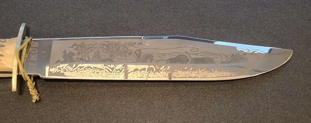 Original handmade German Solingen Inox Linder Bowie knife with etched Western/hunting scene.