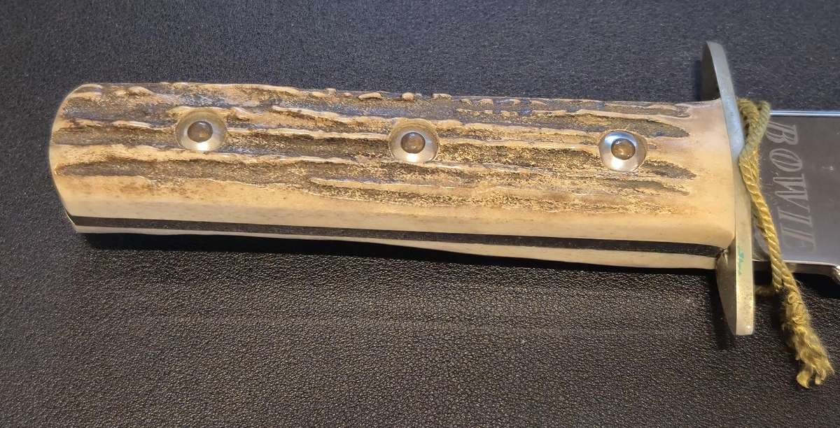 Original handmade German Solingen Inox Linder Bowie knife with etched Western/hunting scene.