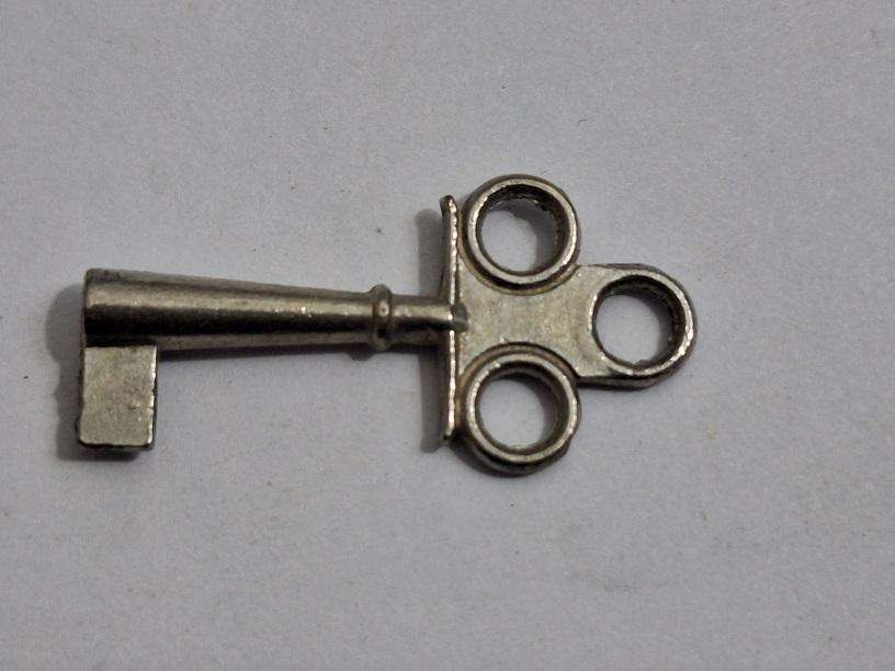 Small key, possibly for small clock or music box