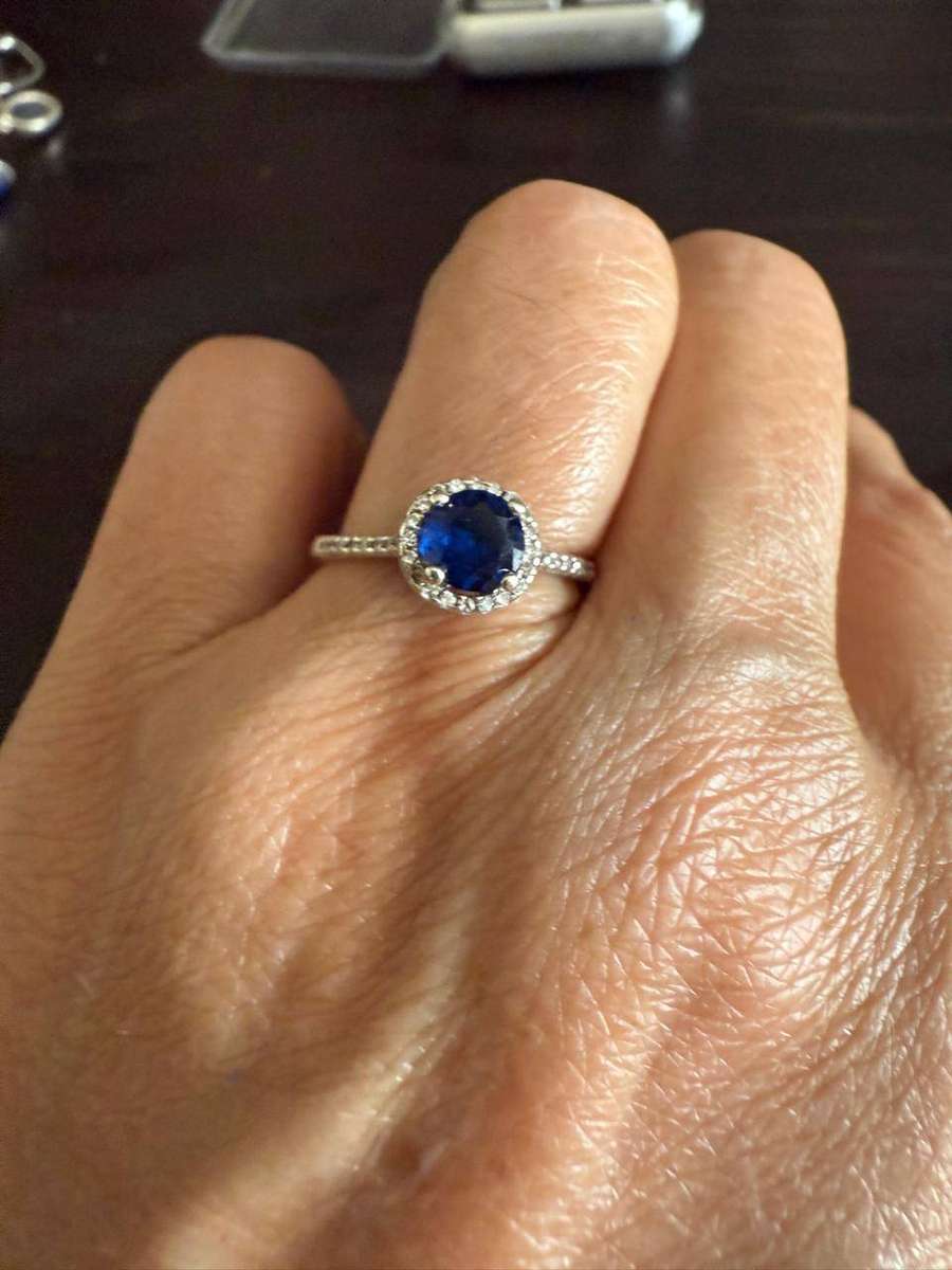 Sterling silver tiny blue stone ring