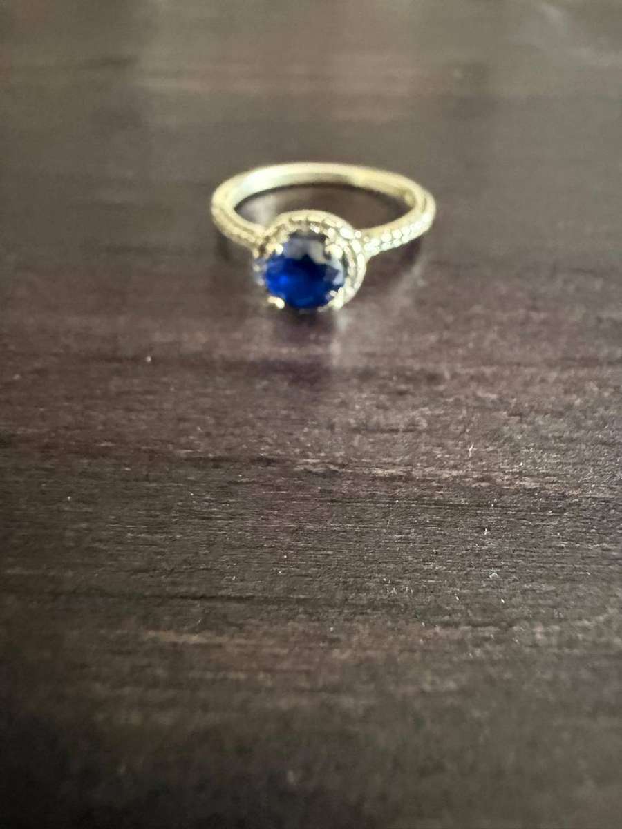 Sterling silver tiny blue stone ring