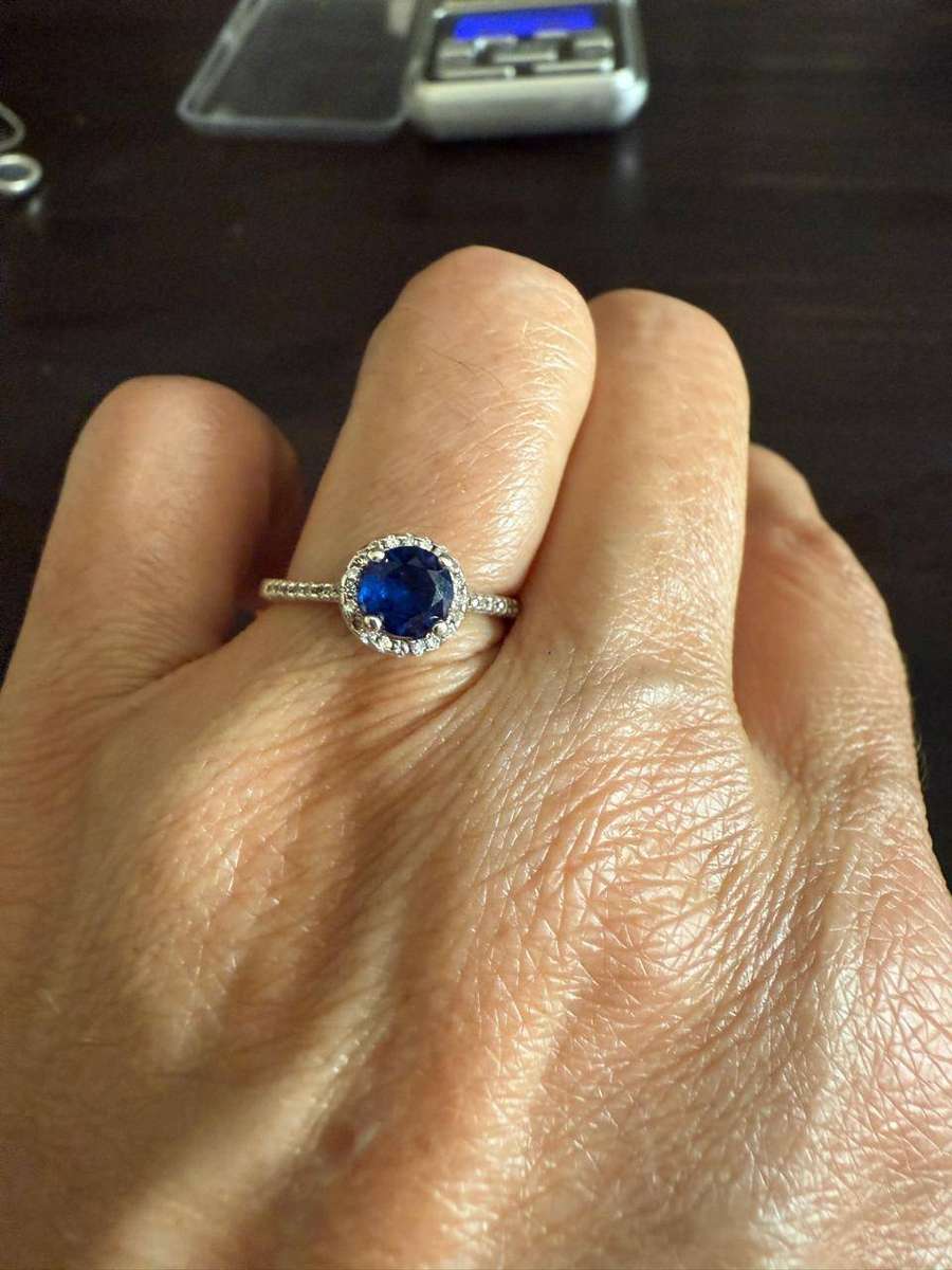 Sterling silver tiny blue stone ring