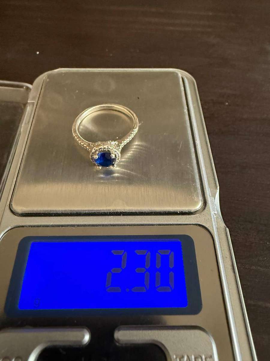 Sterling silver tiny blue stone ring