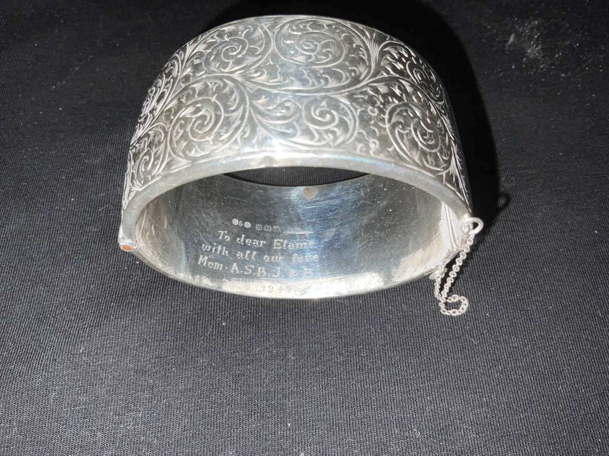 A beautiful vintage sterling silver hinged bracelet inscribed Elaine