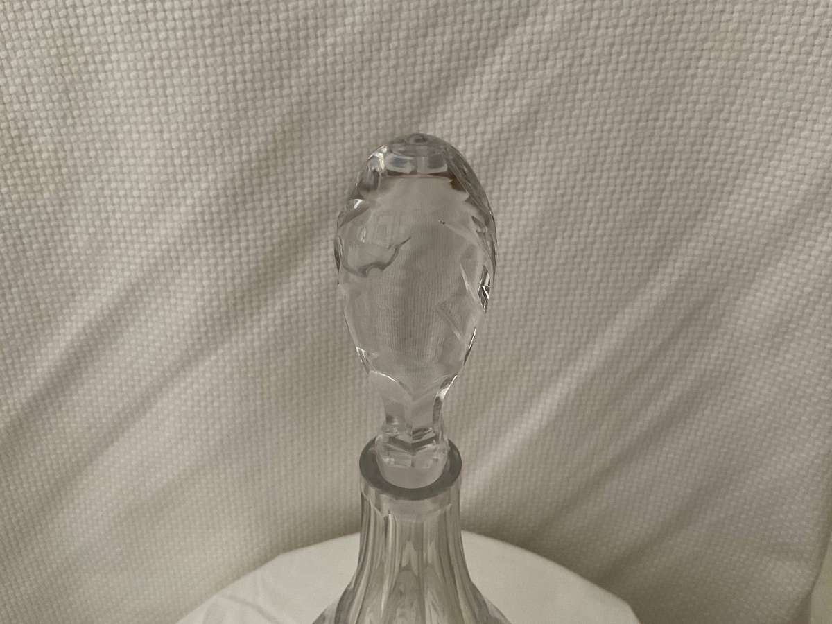 A beautiful vintage heavy cut glass decanter