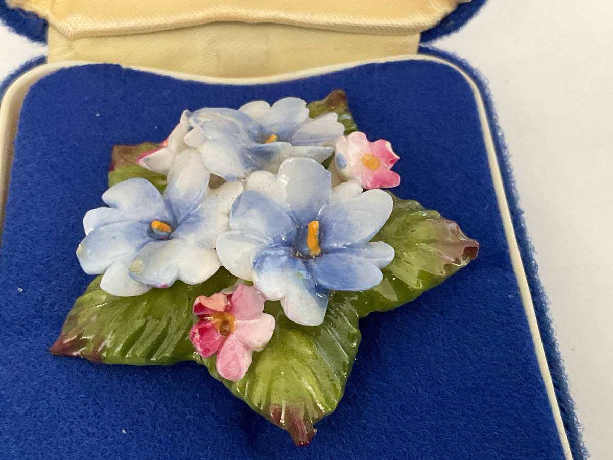 A pretty fine bone china boxed Aynsley brooch