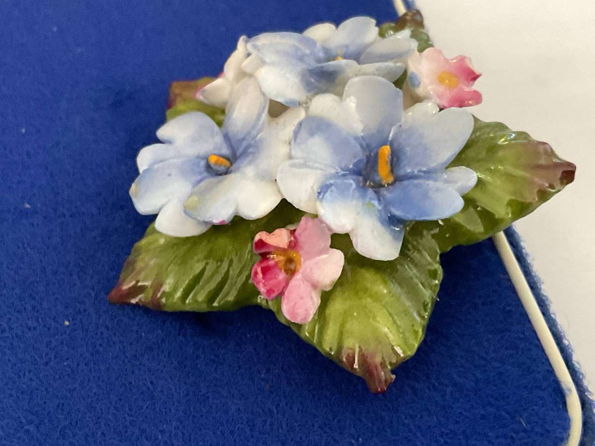 A pretty fine bone china boxed Aynsley brooch