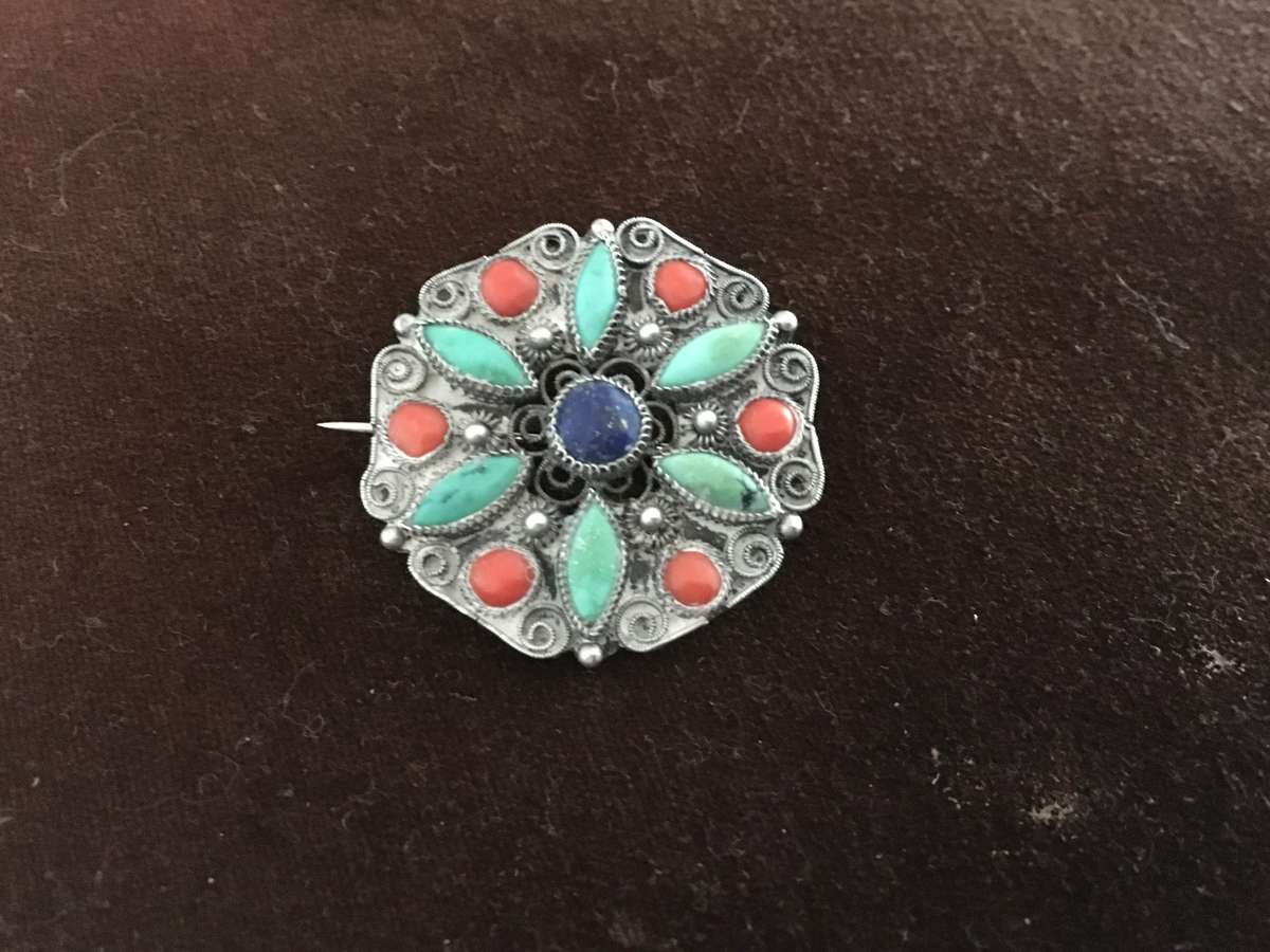 A Chinese Silver Filigree Brooch with Turquoise and Coral Cabochons