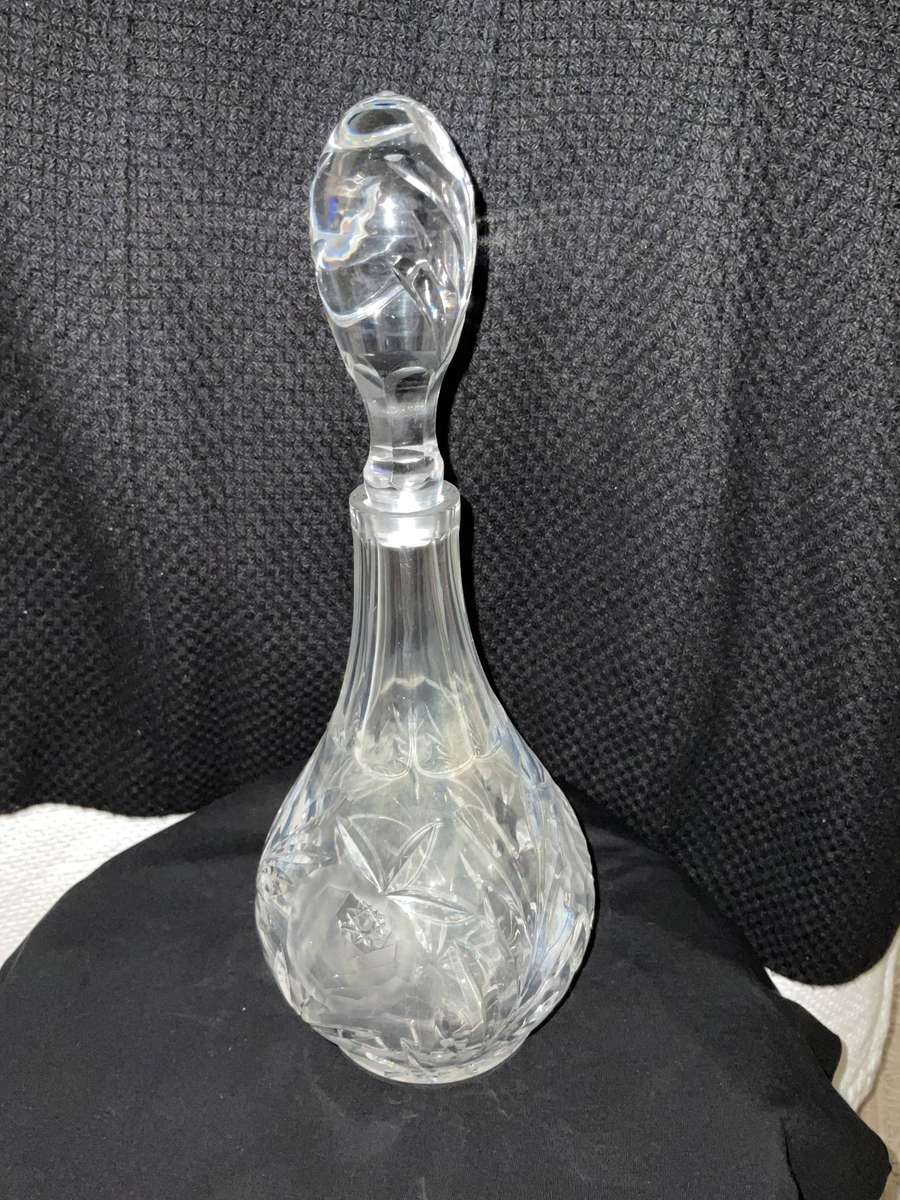 A beautiful vintage heavy cut glass decanter