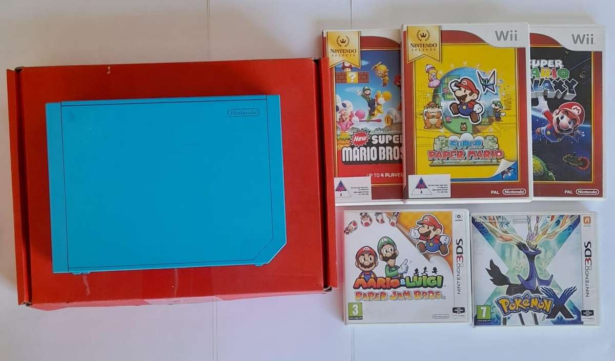 Wii in box complete with games.