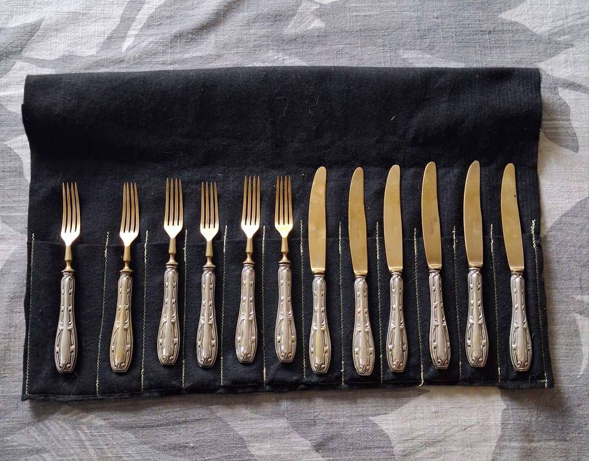EUROPEAN SILVER HANDLES KNIFES AND FORKS 322grams total