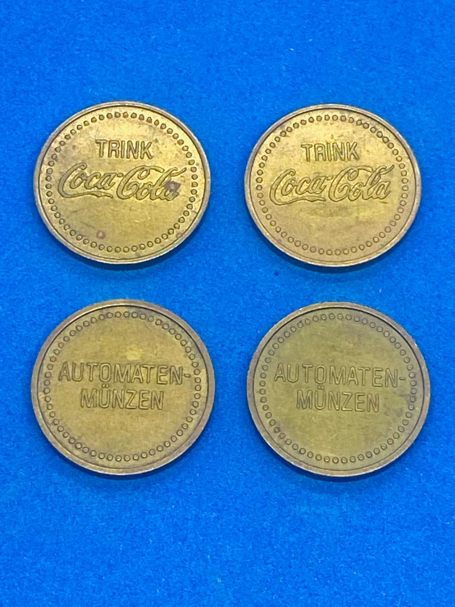 FOUR OLD GERMAN COCA COLA VENDING MACHINE TOKENS