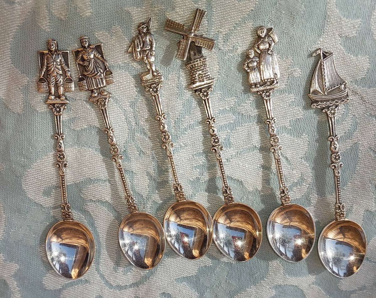 A SET OF DELF TYPE DUTCH COLLECTORS TEASPOONS EPNS SOLD AS IS