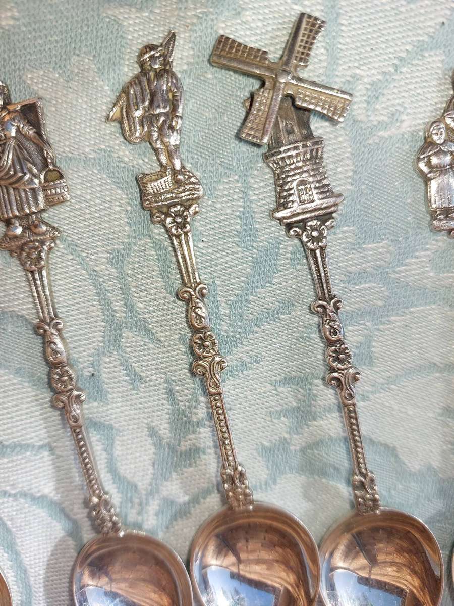 A SET OF DELF TYPE DUTCH COLLECTORS TEASPOONS EPNS SOLD AS IS