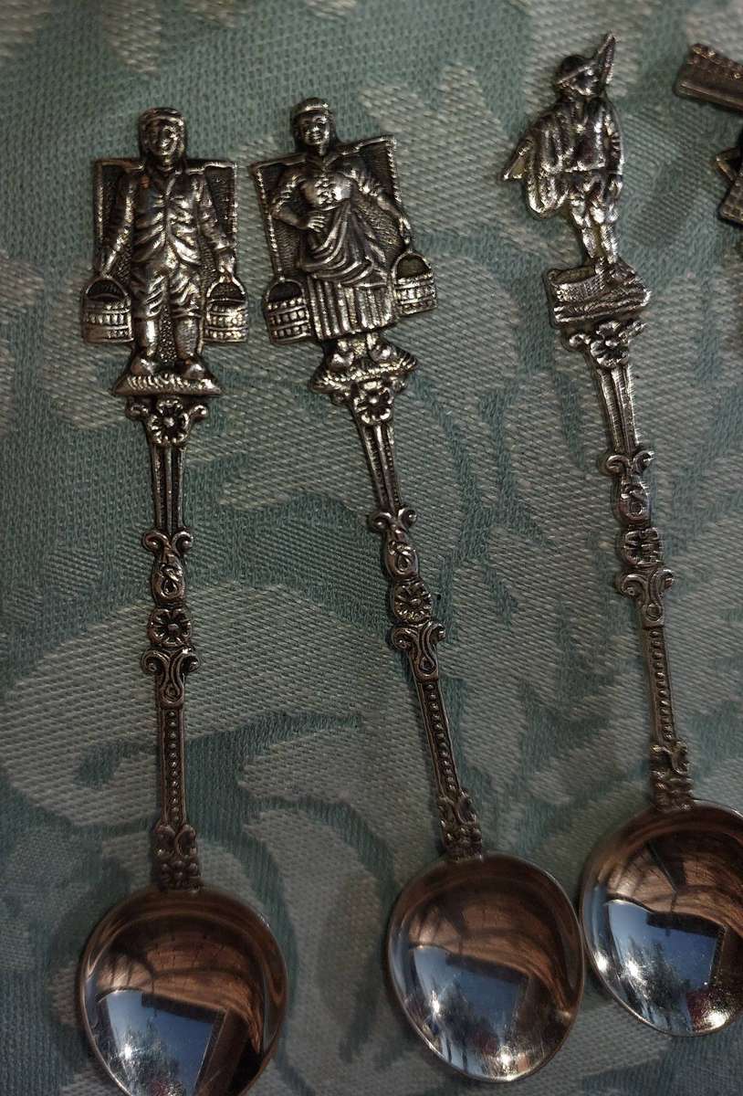A SET OF DELF TYPE DUTCH COLLECTORS TEASPOONS EPNS SOLD AS IS