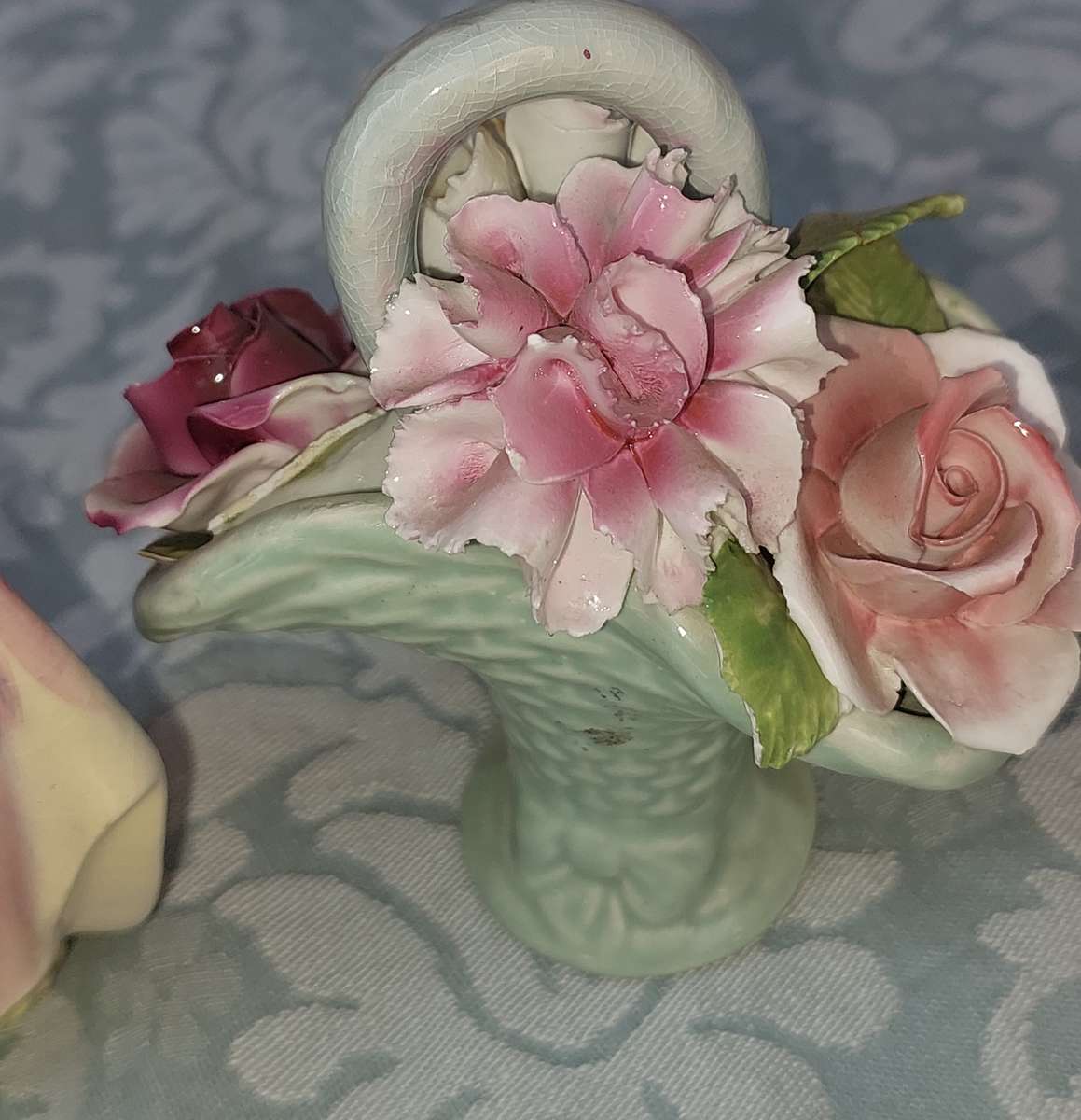 A VINTAGE AND ANTIQUE COLLECTION OF PORCELAIN FIGURINES