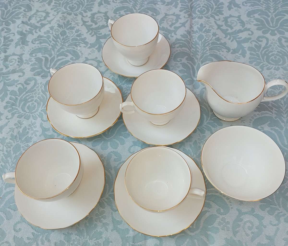 A VINTAGE 12-PIECE TEA SET BONE CHINA E969 QUEEN ANNE