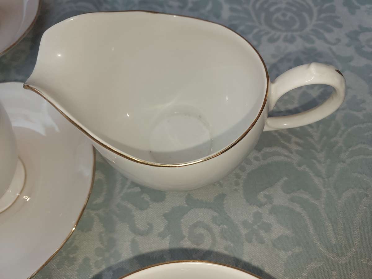A VINTAGE 12-PIECE TEA SET BONE CHINA E969 QUEEN ANNE