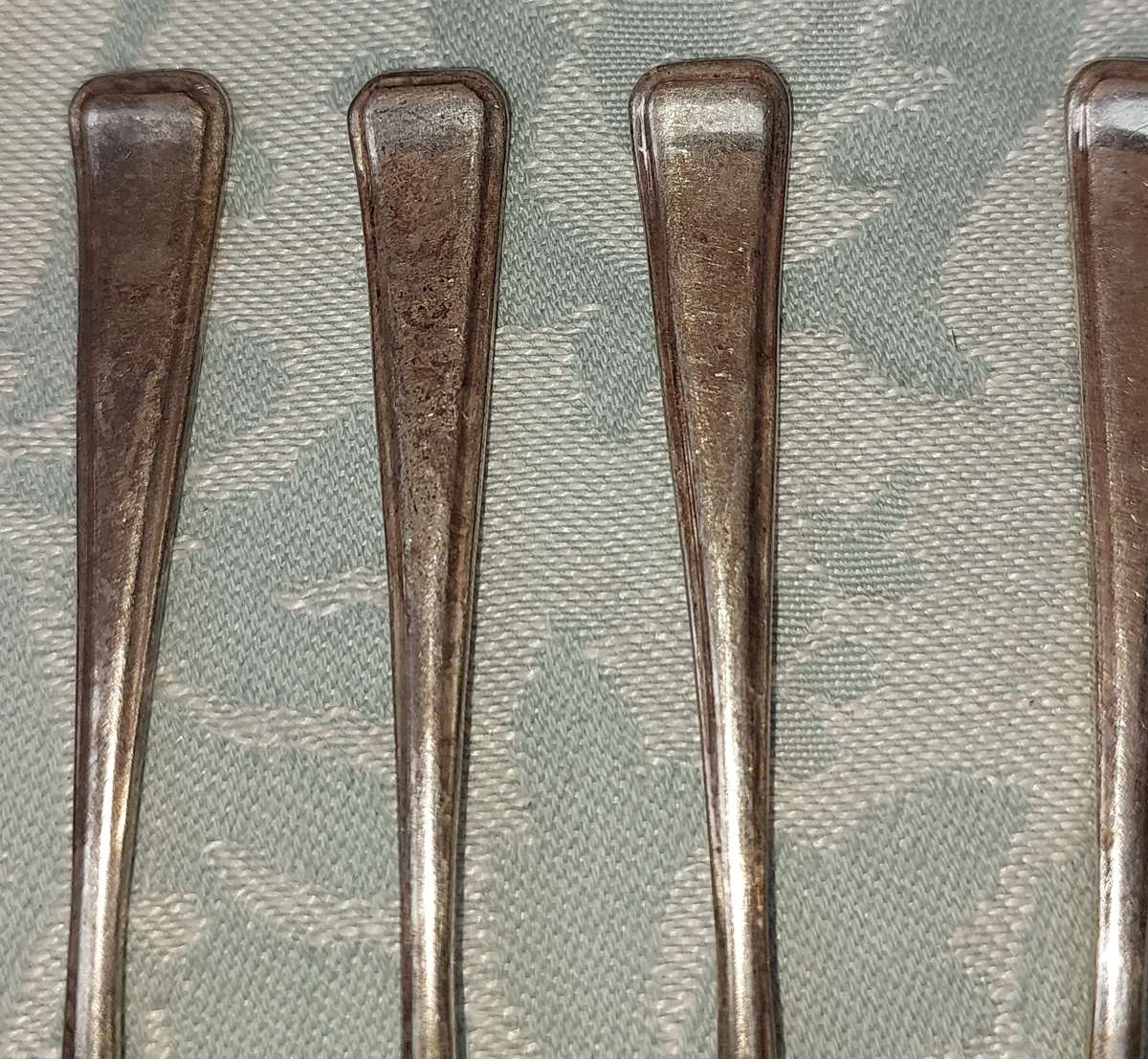 A SET OF EPNS COCKTAIL FORKS