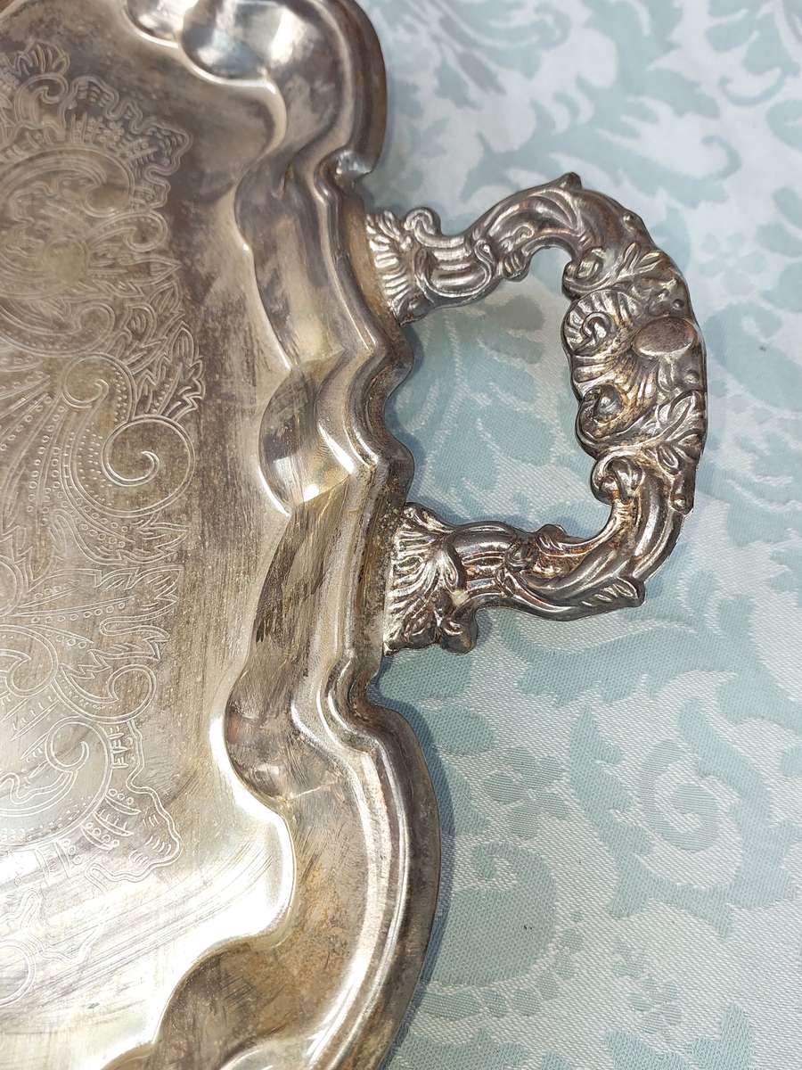 A VICTORIAN STYLE SILVER PLATED SERVING TRAY