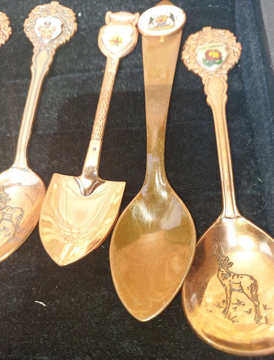 Copper African game animal memorabilia spoons - set of 11