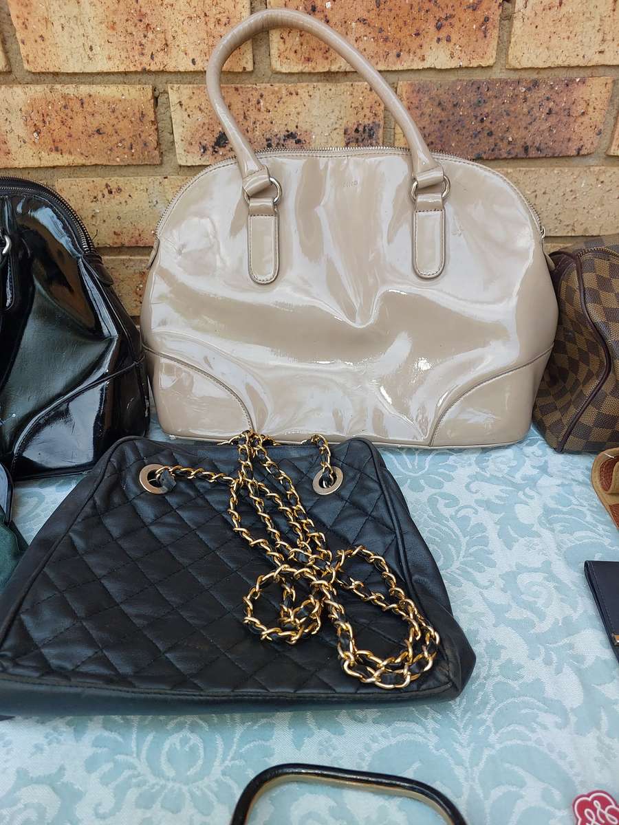 A JOBLOT USED HANDBAGS AND PURSES