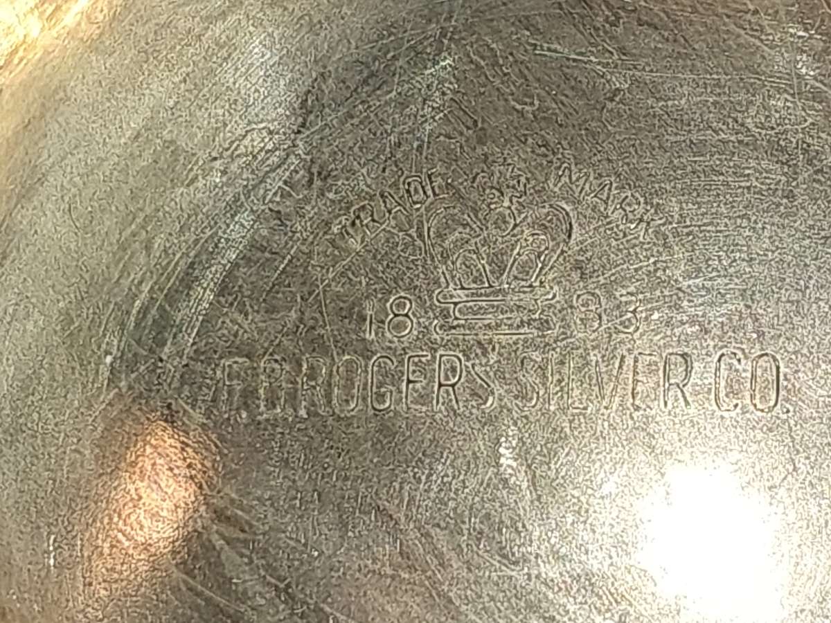 AN ANTIQUE SILVER PLATED TEA JUG SET