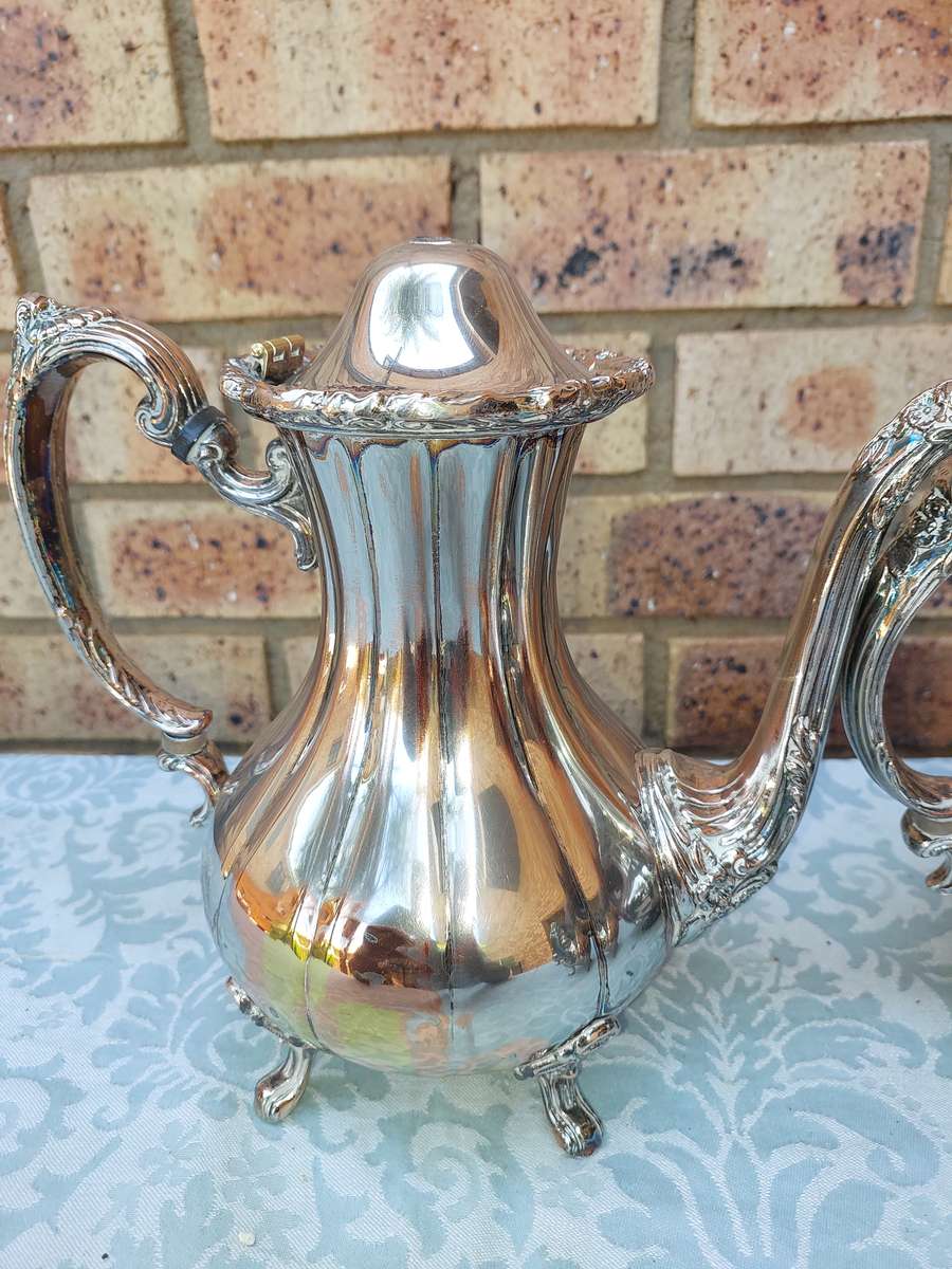 A VINTAGE VICTORIAN SILVER PLATED  JUG TEA SET THAT NEEDS SOME REPAIRS