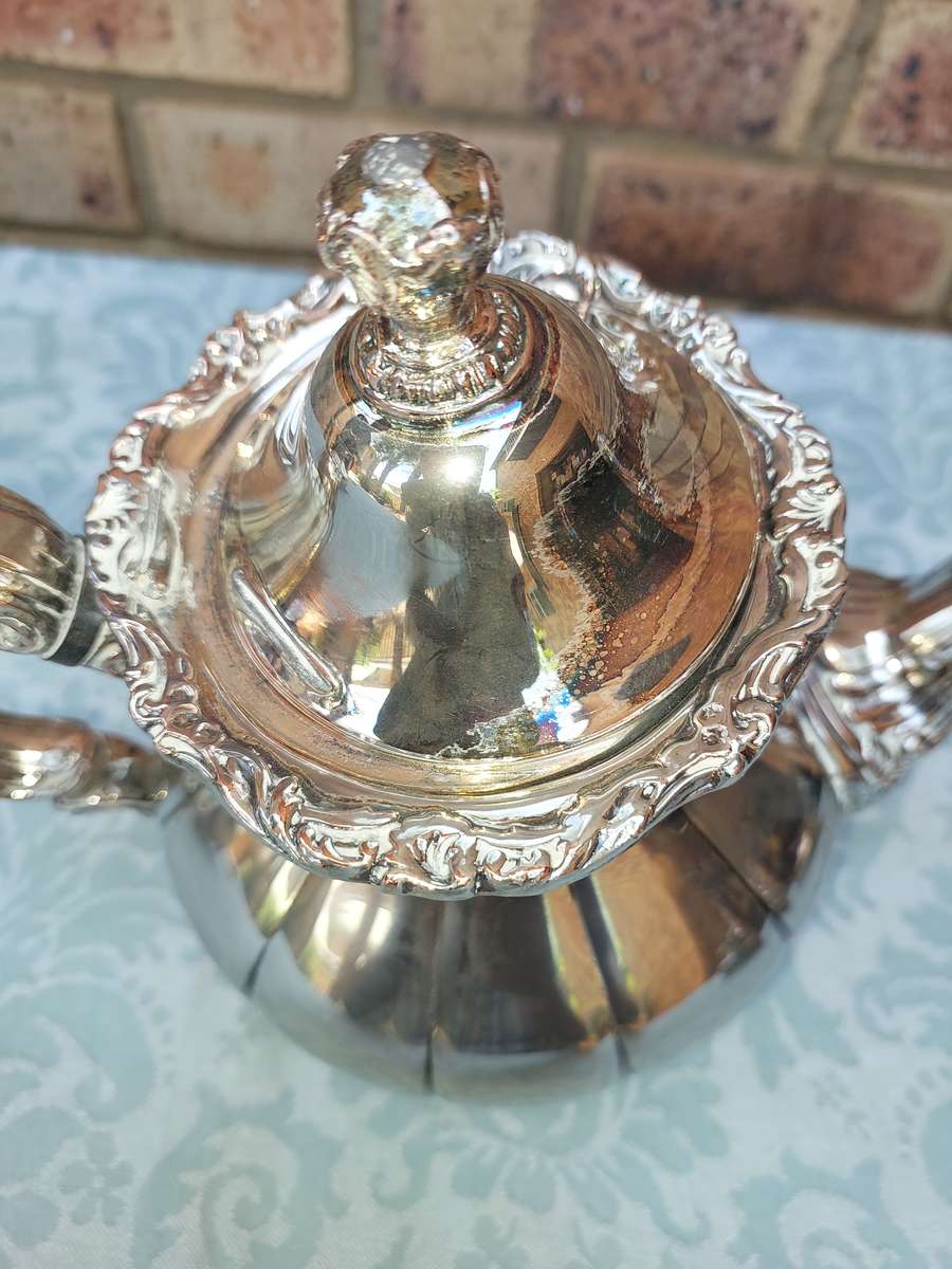 A VINTAGE VICTORIAN SILVER PLATED  JUG TEA SET THAT NEEDS SOME REPAIRS
