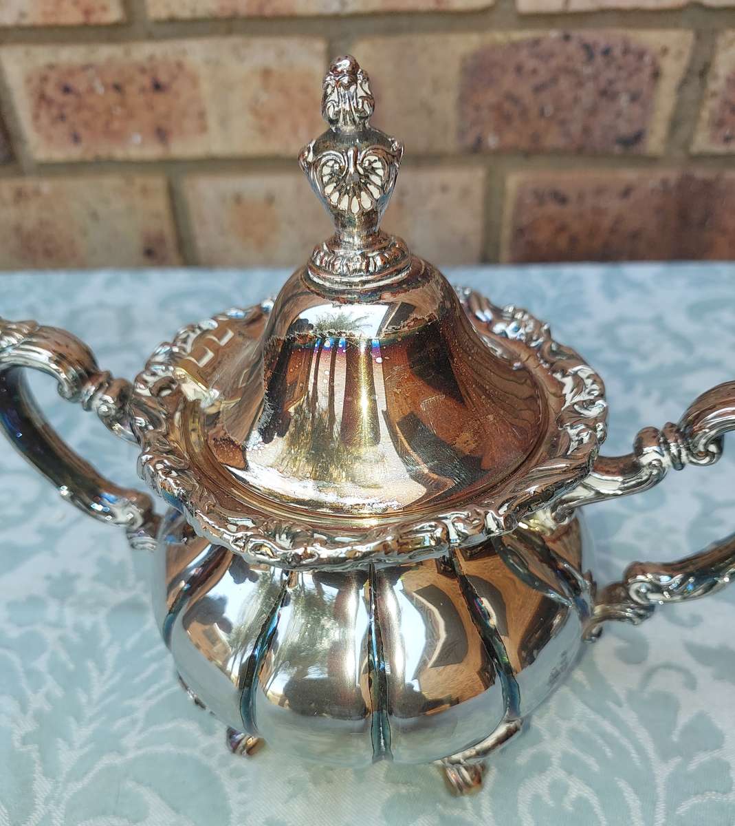 A VINTAGE VICTORIAN SILVER PLATED  JUG TEA SET THAT NEEDS SOME REPAIRS