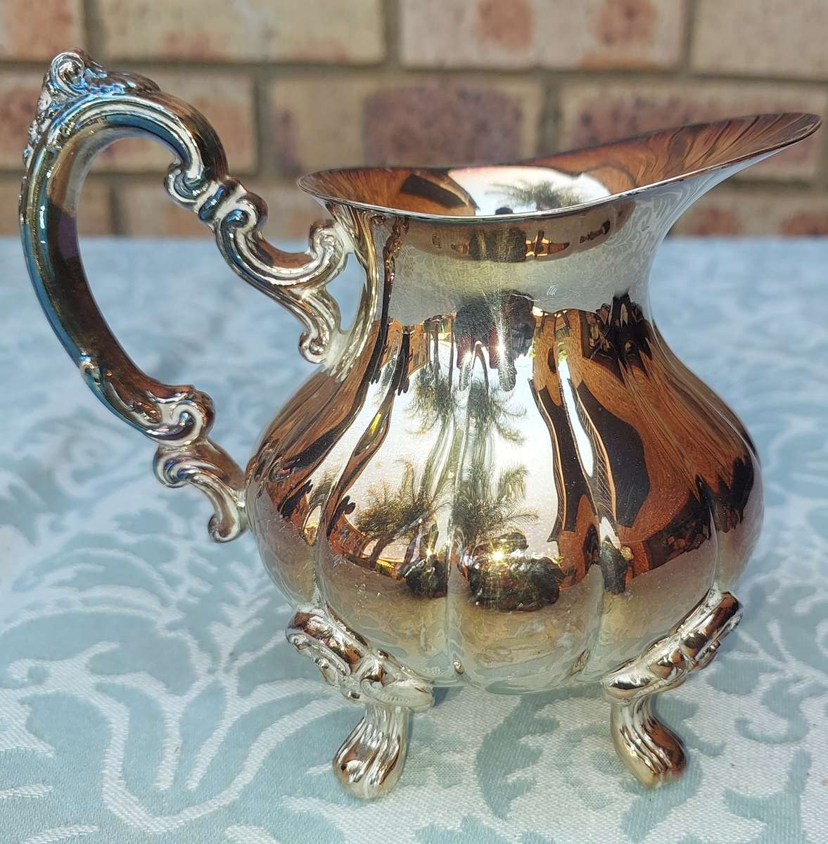 A VINTAGE VICTORIAN SILVER PLATED  JUG TEA SET THAT NEEDS SOME REPAIRS