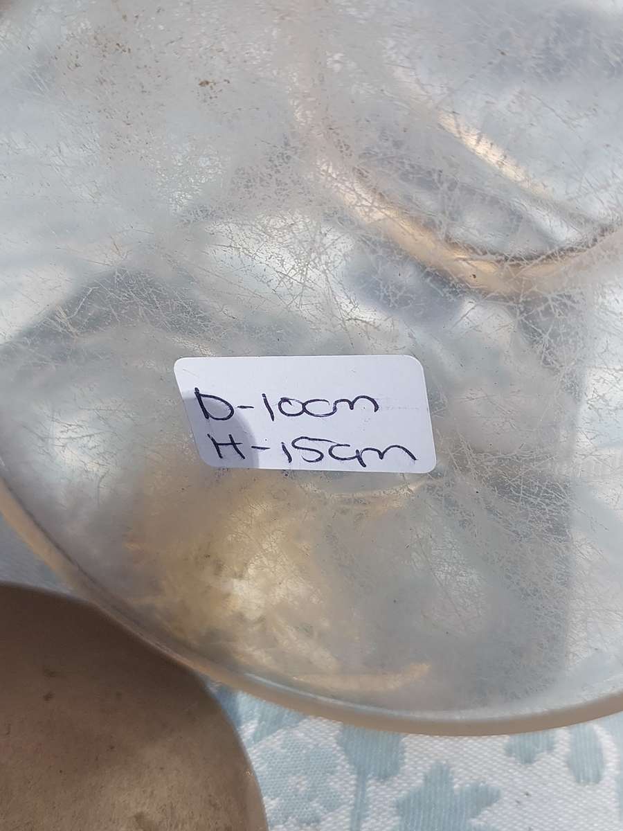 A VINTAGE CUT GLASS ICE BUCKET WITH A SILVER PLATED LID AND HANDLE