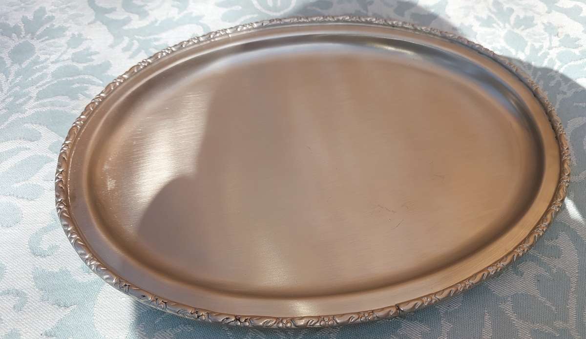 A VINTAGE OVAL CHASE EDGE SERVING TRAY