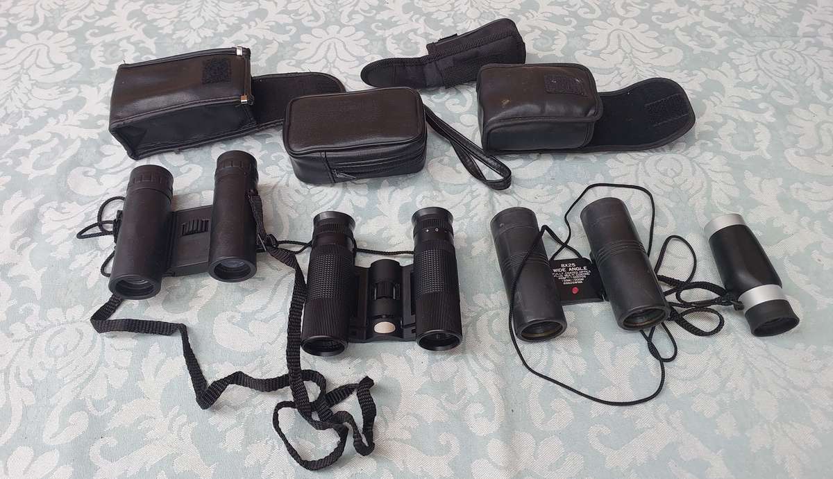 A JOBLOT COLLECTION OF POCKET BINOCULARS SOLD AS IS R450