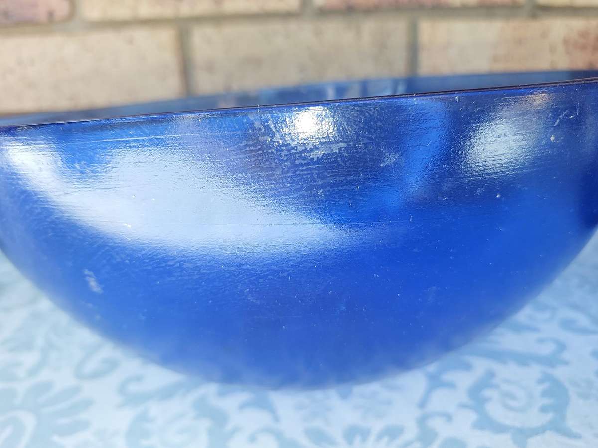 ACOLLECTION OF THREE GLASS SERVING BOWLS SOLD AS IS