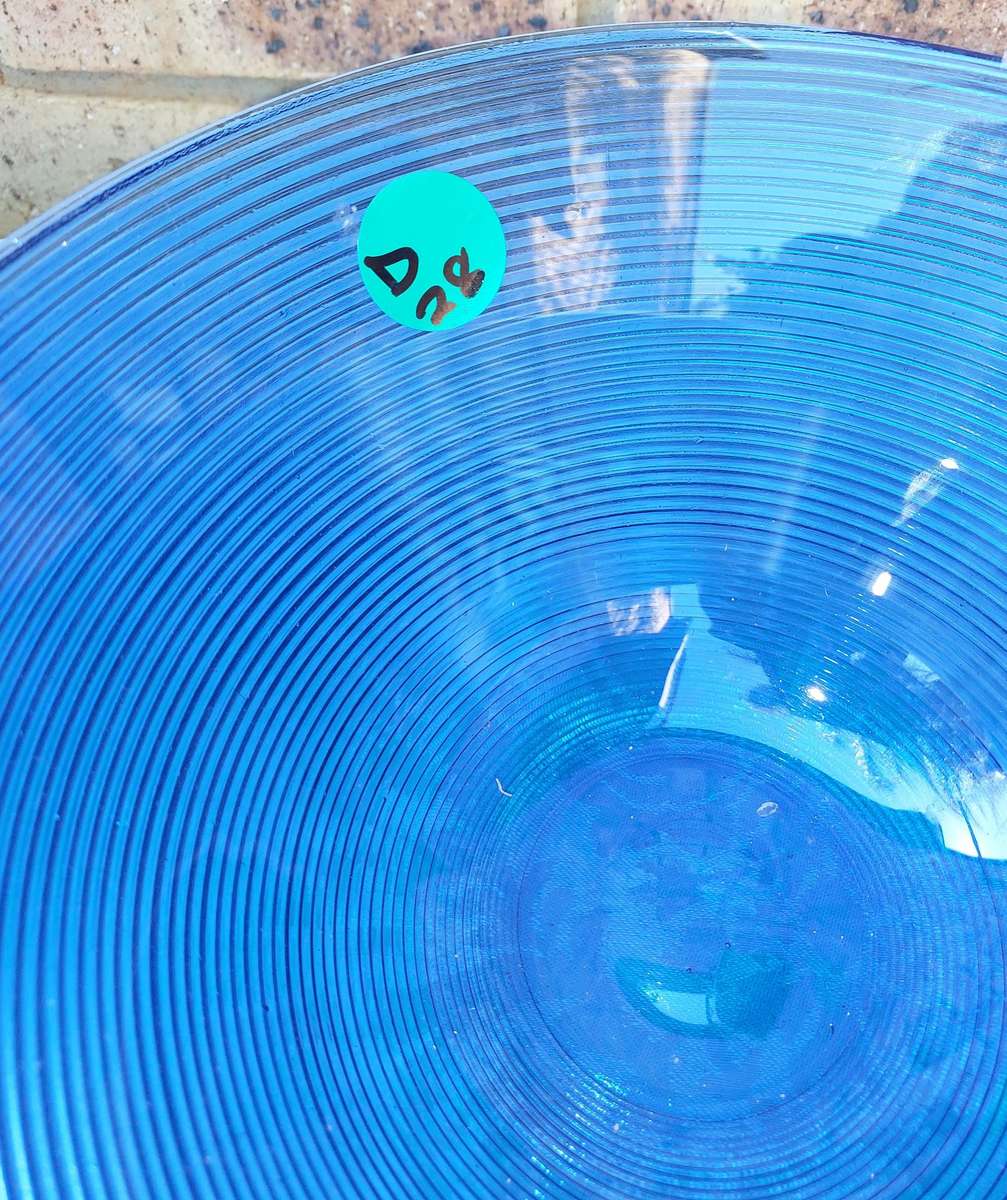 ACOLLECTION OF THREE GLASS SERVING BOWLS SOLD AS IS